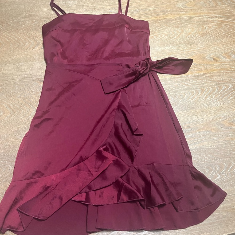 Formal mini dress by Polly.